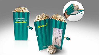 Mkt-Direto | Mala direta porta voucher com popup de pipoca. Criação para Contax.