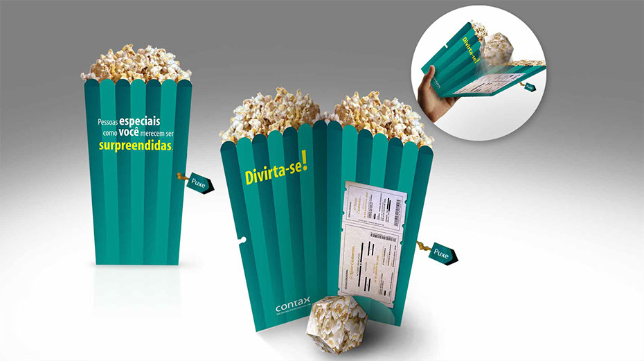 Mkt-Direto | Mala direta porta voucher com popup de pipoca. Criação para Contax.